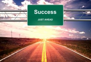 success-just-ahead-road-sign--life-success-concept