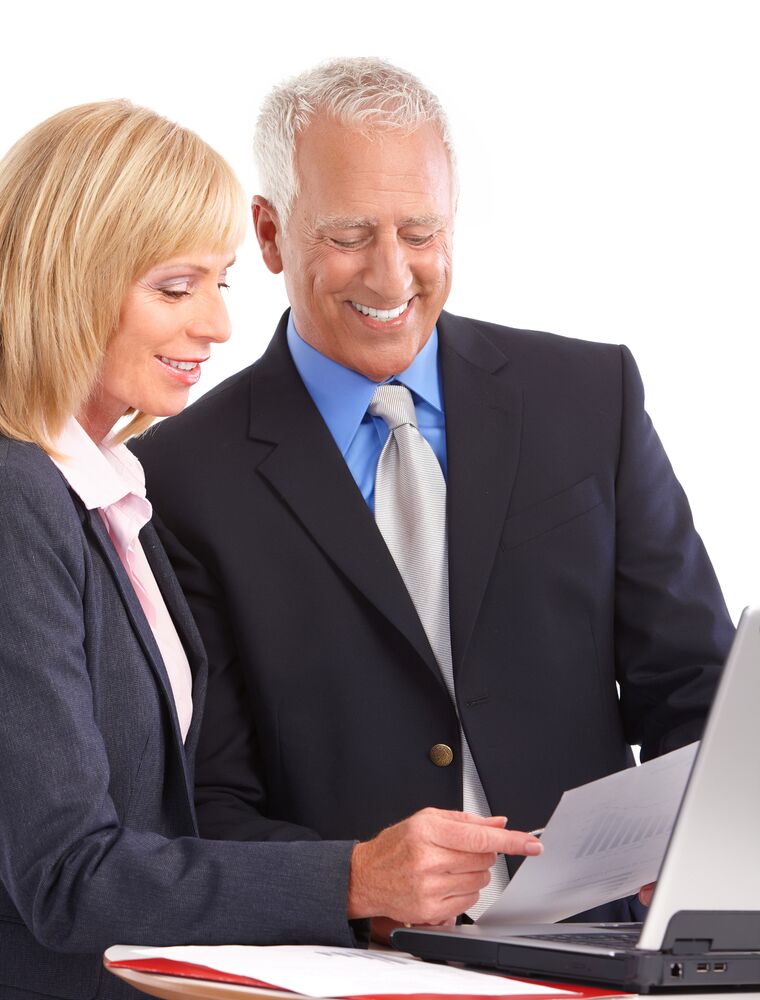 Performance Reviews - professional man and woman speaking over laptop