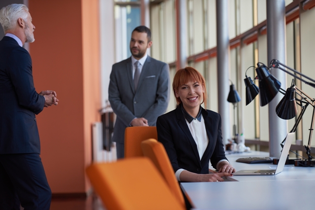 Chief Brand Officer - professionals in conference room