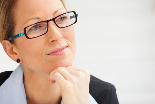 Mergers and Acquisitions - business woman_glasses_thinking