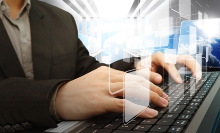 Tech-Jobs-Man-working-on-computer-with-graphic-images