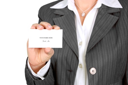 Mindful Career Strategies - Professional Woman Holding Business Card