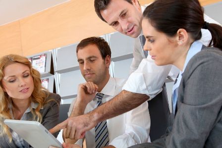 Organizational Development concept - employees working together