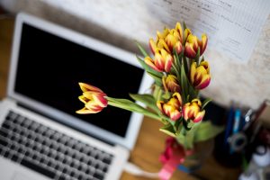 Working from Home - desk laptop flowers
