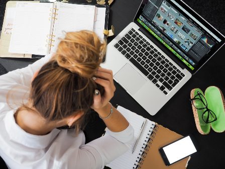 Stress Free Ways of Taking on New Work Projects - Busy female employe at desk