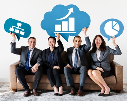 Communication tips for Change - 4 business people holding blue graphic signs